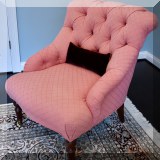 F33. Pair of Tufted pink chairs on casters. 36”h x 30”w x 32”d - $275 each 